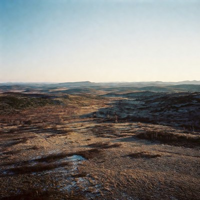 Vast Hilly Landscape at Sunset