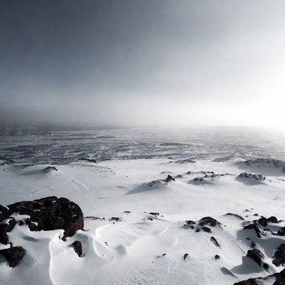 Snowy Landscape with Dark Rocks