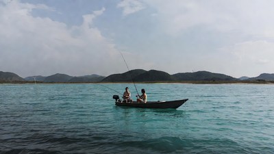Two men fishing from boat
