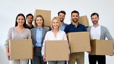 Diverse team holding cardboard boxes