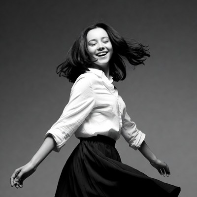 Young woman dancing in white shirt