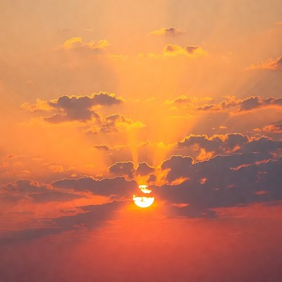 Sunset Sun Behind Clouds