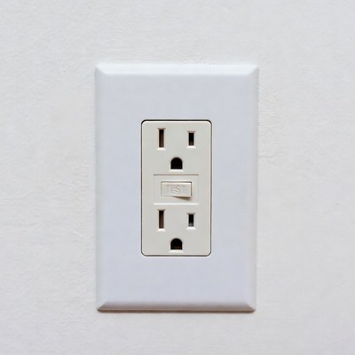White GFCI Outlet on Wall