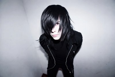 Man with long black emo hair