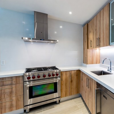 Modern Kitchen with Red Gas Range
