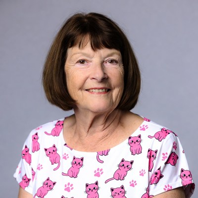Elderly woman in pink cat shirt