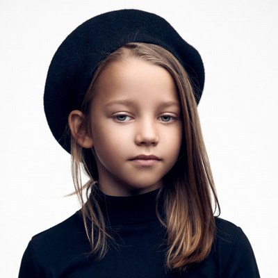 Girl wearing black beret