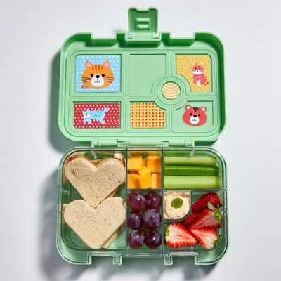 Open green bento lunchbox with animals
