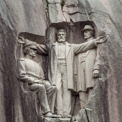Stone Relief of Three Historical Men