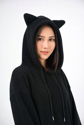 Asian woman in black cat ear hoodie