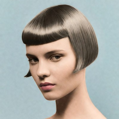 Woman with sleek grey bob haircut
