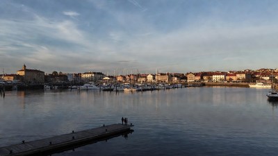 Harbor with Sailboats and Distant Buildings