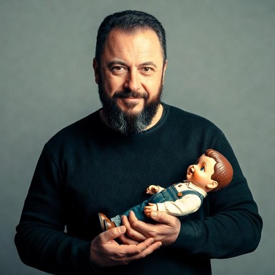 Man holding baby doll