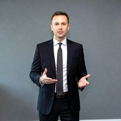 Man gesturing in suit