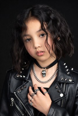 Asian girl in studded leather jacket
