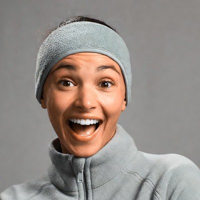 Smiling woman wearing gray headband