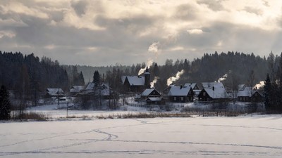 Snowy Village with Church and Smoky Chimneys