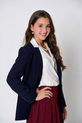 Teen girl in navy blazer and skirt