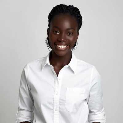 Smiling African-American woman in white shirt