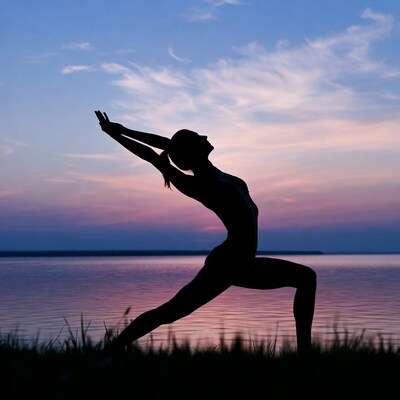 Silhouette woman doing yoga by lake