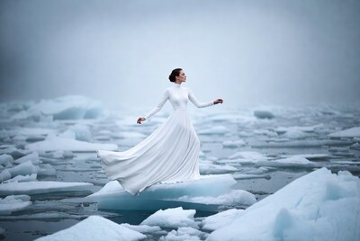 Woman in white dress on ice floes