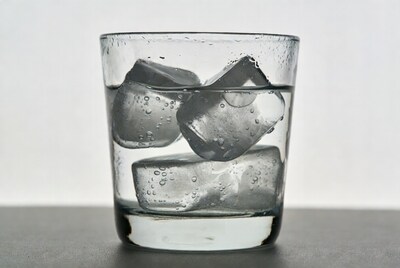 Glass of water with ice cubes