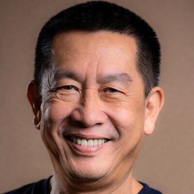 Smiling Asian man close-up portrait