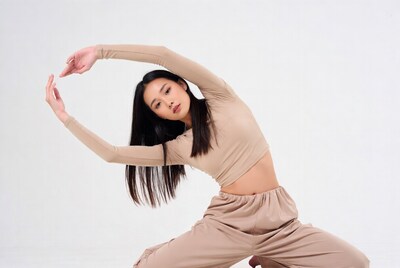 Asian woman doing yoga stretch