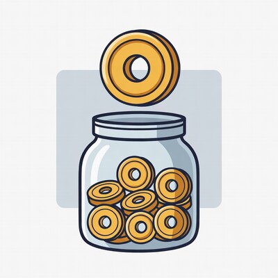 Coin dropping into money jar