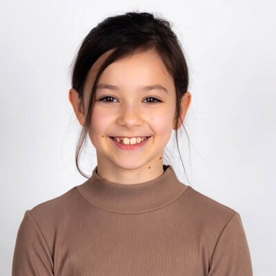 Asian girl smiling on white background