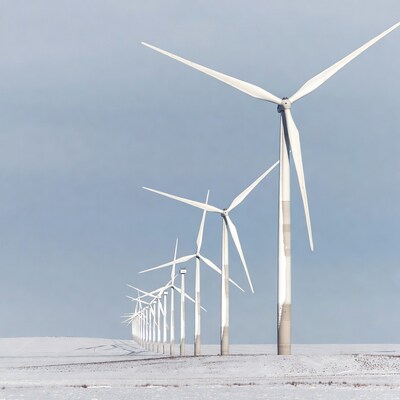 Wind Turbines in Snowy Field