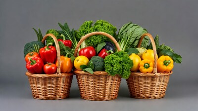 Fresh vegetables in three wicker baskets