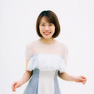 Asian woman smiling in blue dress