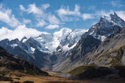 Snowy Alpine Mountains with Valley