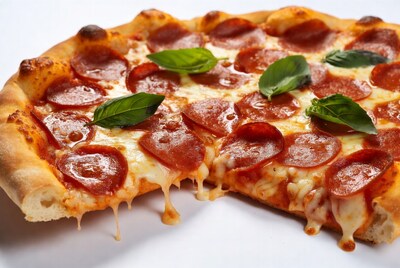 Pepperoni Pizza with Basil Leaves