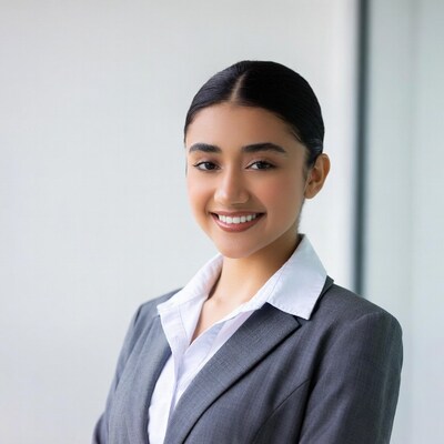 Smiling Asian woman in gray suit