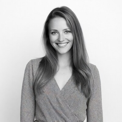 Smiling woman in polka dot dress