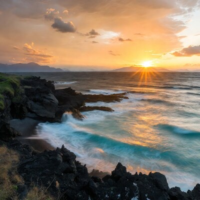 Sunset over rocky ocean coast