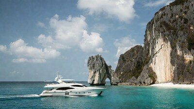 White yacht sailing near Phang Nga Bay rock arch
