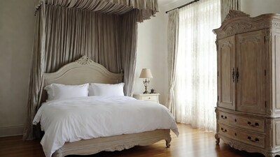 Elegant Canopy Bed with Armoire