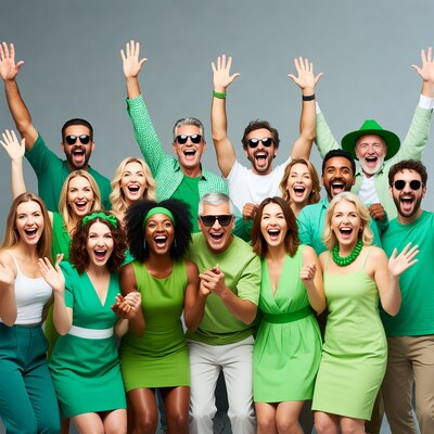 Diverse group celebrating in green outfits