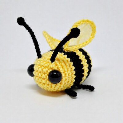 Crocheted yellow bumblebee toy