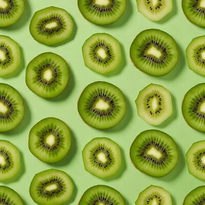 Sliced Kiwi Fruits on Green Background