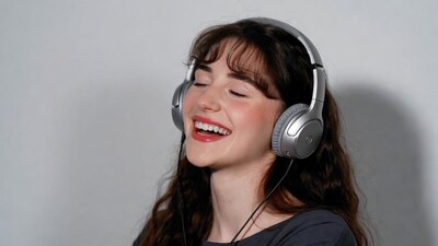 Woman smiling with headphones