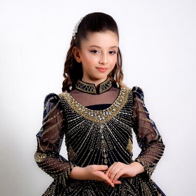 Girl in black beaded gown