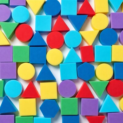 Colorful foam shapes on white background