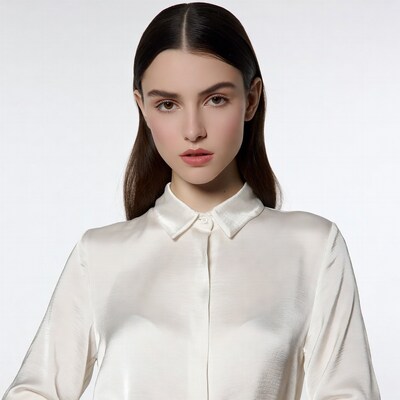 Woman in white silk shirt