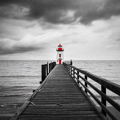 Red Lighthouse on Pier Over Ocean