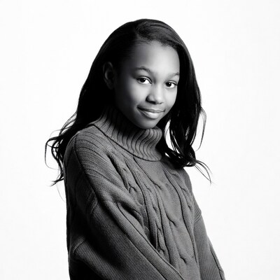 African-American girl in turtleneck sweater