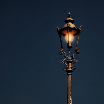 Vintage street lamp glowing at night